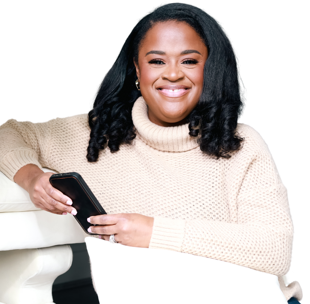 Alicia Perkins seated, reviewing notes on her phone